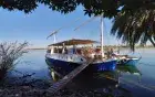 Nile Valley from the lotus boat — the journey to Dendera passes villages unchanged for centuries